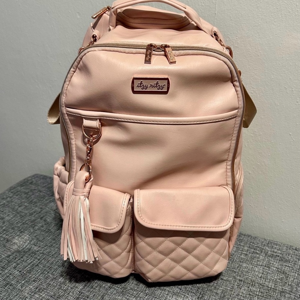 Itzy Ritzy Pink Quilted diaper bag with stroller straps
